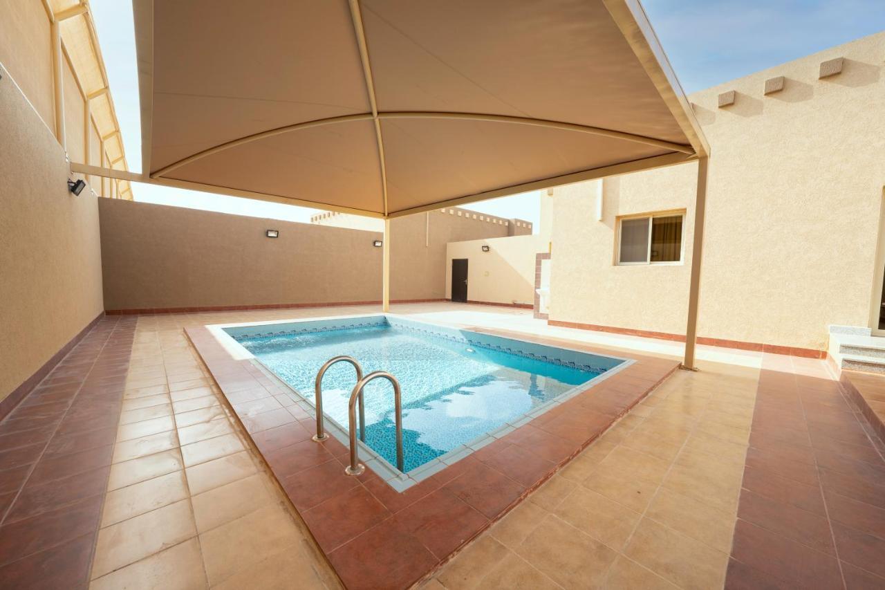 Mirada Gold Jizan - Resort & Private Pools מראה חיצוני תמונה A swimming pool in Al-Shaqra, Saudi Arabia